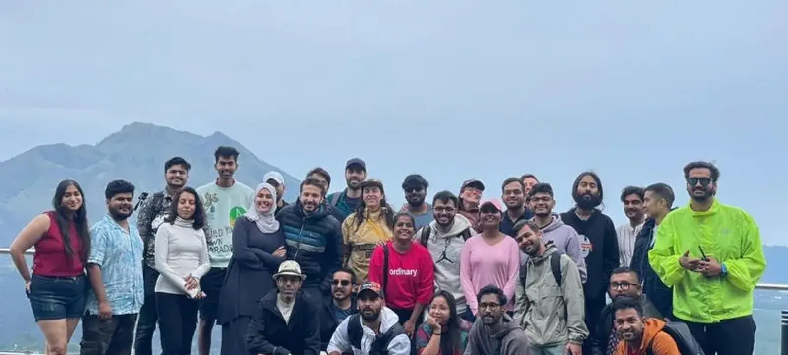 A student group photographed together at the end of a programme.